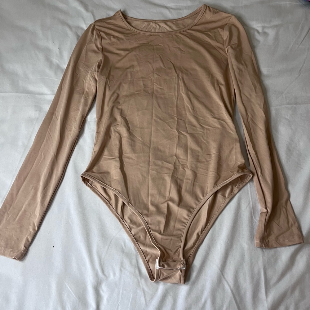 Tan Body suit never worn before